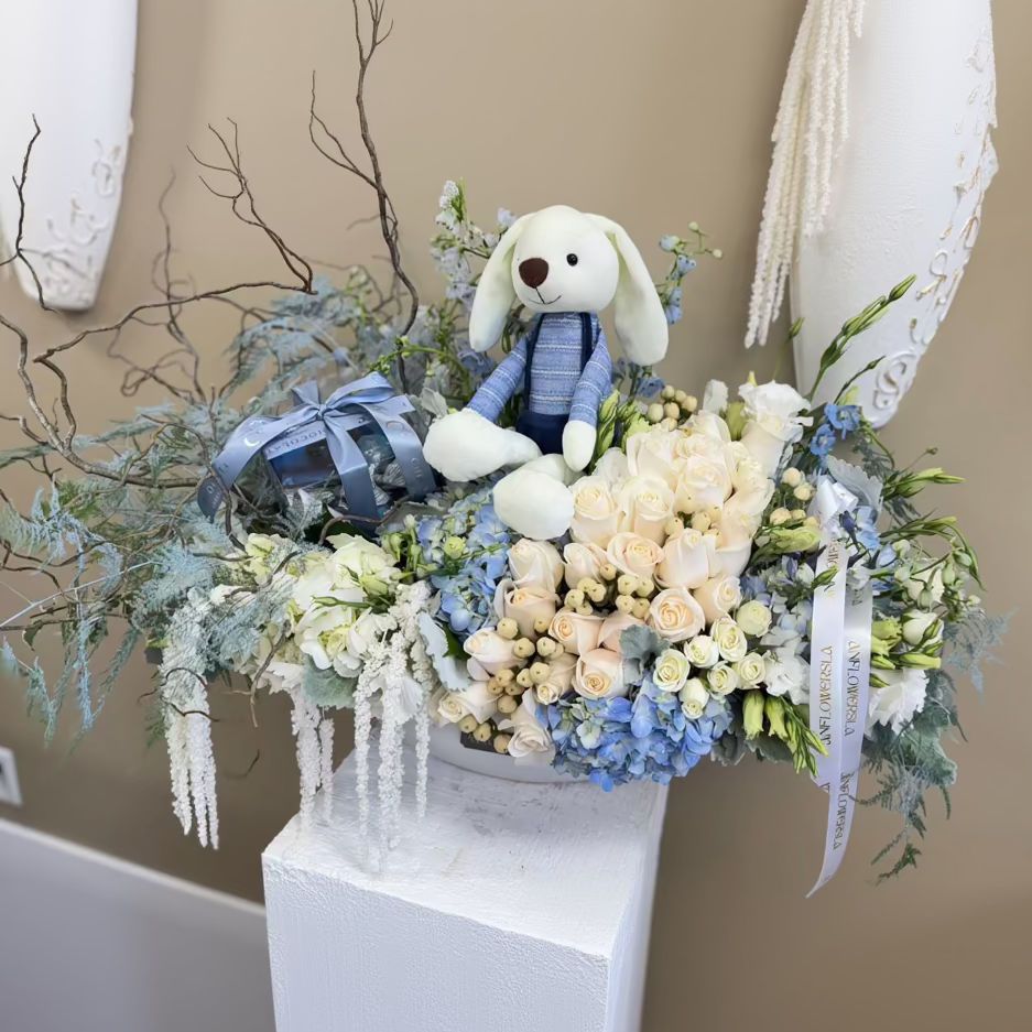 Blue arrangement with bunny