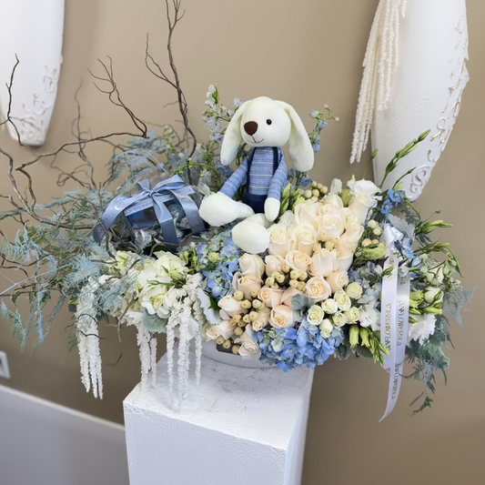 Blue arrangement with bunny
