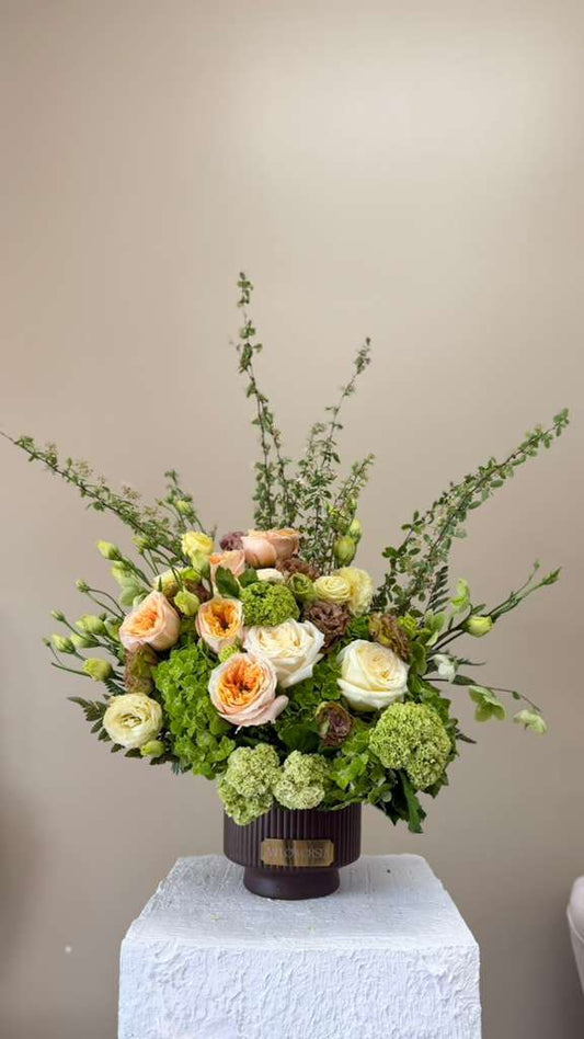 Peach garden roses with Green Hydrangea and Viburnum